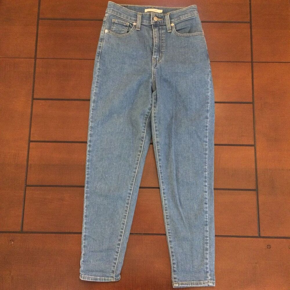 Levi’s high waisted taper jeans 25 medium wash